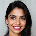 Headshot of Aisha Khan, smiling.